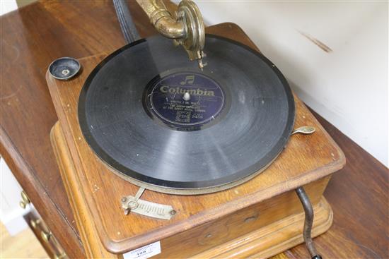 A gramophone with brass horn
